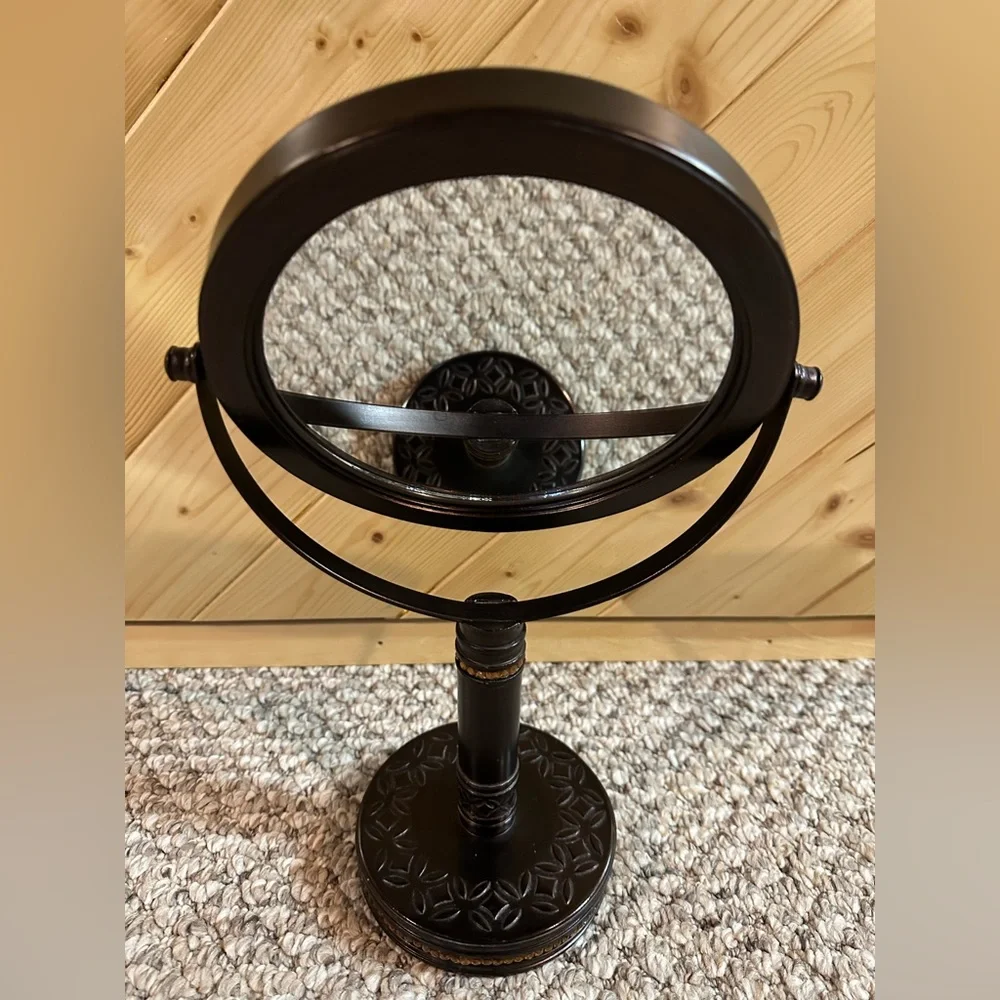 Bathroom countertop double sided magnification mirror.
